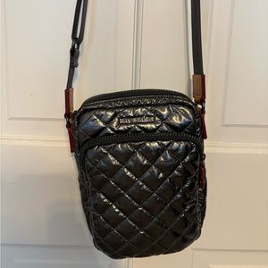 Dark gray/shiny silver Mz Wallace crossbody.  Great for every day use.